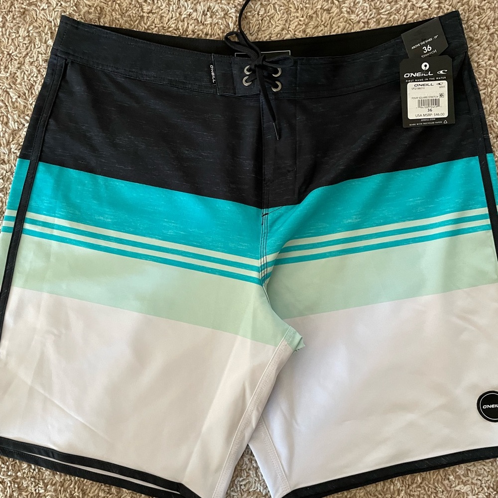 New with tags O’Neill Board Shorts Teal/black/white/green